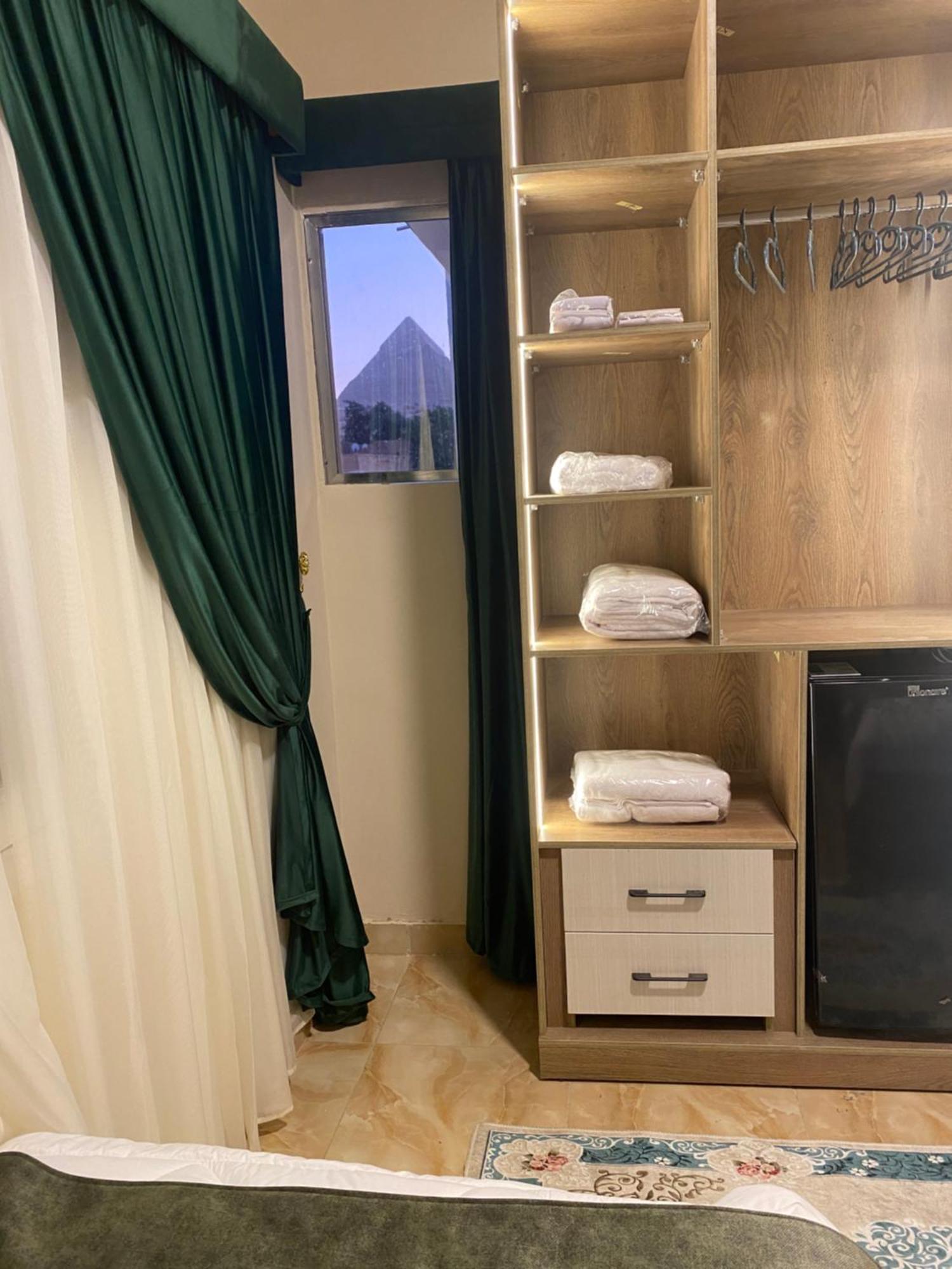 Global Pyramids Hotel Kafret el-Gabal Extérieur photo